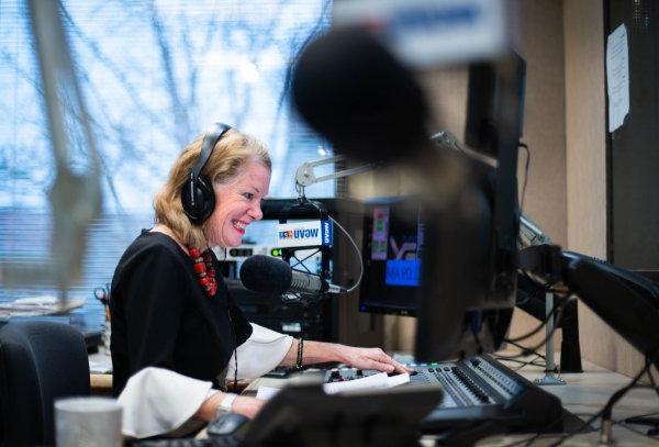 WGVU's Shelley Irwin smiles while on the air during her morning show.